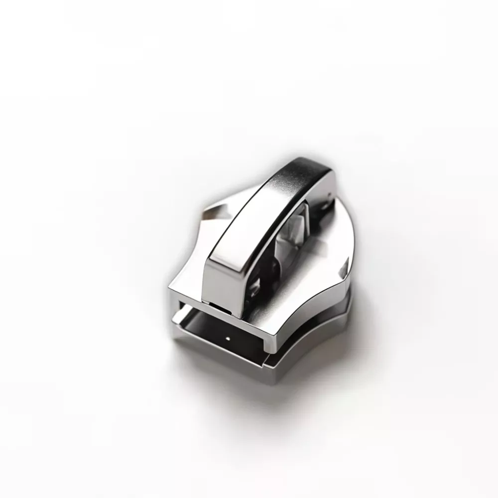 Automatische vergrendelingsschuif voor metalen ritssluiting