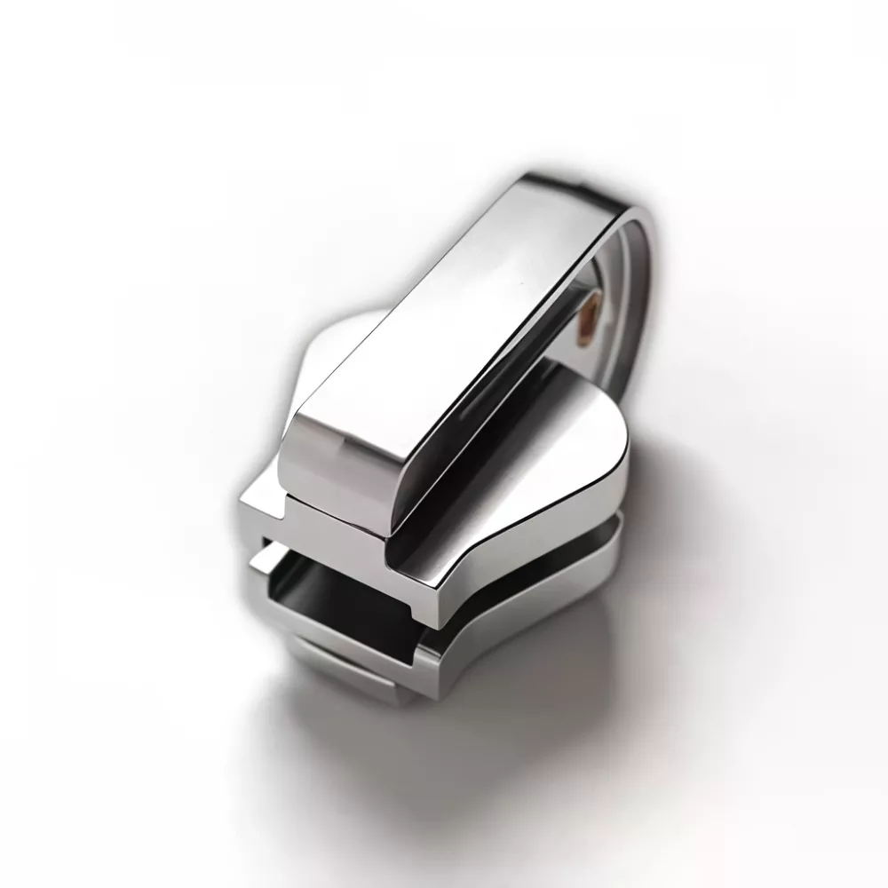 Omkeerbare schuifregelaar voor kunststof ritssluiting